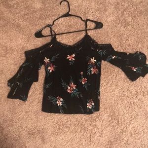 An Aeropostale shirt it cuts off at the shoulders